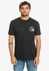 Black cotton t-shirt featuring short sleeves and a crew neck, with a white logo detail on the left chest area.