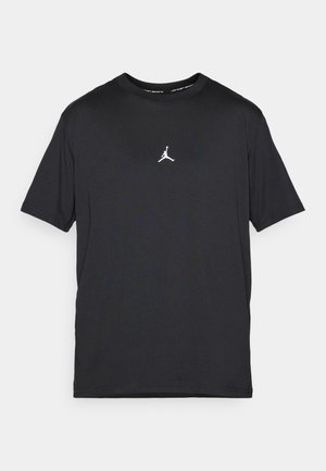 T-shirt noir en mélange de coton, avec un col rond et des manches courtes. Logo blanc notable imprimé sur la poitrine. Texture lisse.