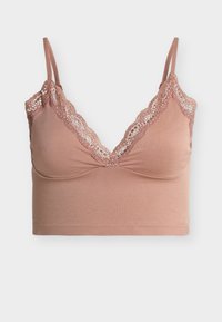 Απαλό ροζ bralette με δαντέλα στο στρογγυλό ντεκολτέ σε σχήμα V και λεπτούς ρυθμιζόμενους ιμάντες ώμων, απαλό κάτω λάστιχο χωρίς ραφές για άνεση.