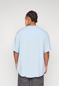 Pier One Pluus - light blue