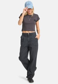 STAY GROUNDED  - Trousers - black