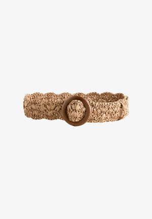 Woven natural fiber belt with scalloped edges and circular wooden buckle in light brown tones.
