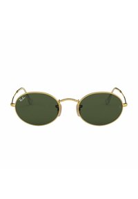 Occhiali da sole ovali con lenti verde scuro, montatura in metallo dorato e naselli in plastica trasparente. Presentano delle sottili aste in metallo con estremità curve.