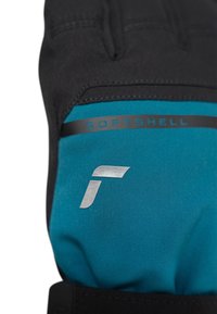 Black softshell gloves featuring a turquoise fabric section, with a silver logo and "SOFTSHELL" printed in black. Reinforced stitching details visible.