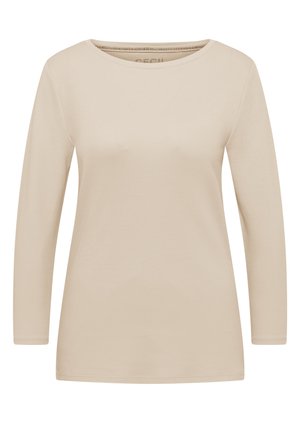 T-shirt beige à manches longues en tissu doux, avec un col rond et une coupe droite. Aucun motif ni accent visible.