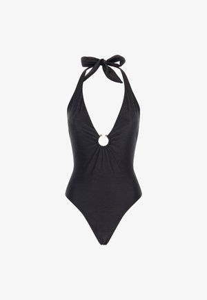Zwarte halternek éénstuk zwempak met een diepe V-hals, geraffineerd middenstuk en cirkelvormige metallic accent. Glad stoffen structuur.
