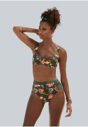 Floral-patterned bikini set in olive green. The top features wide straps and a bow detail; high-waisted bottoms with matching floral panels.