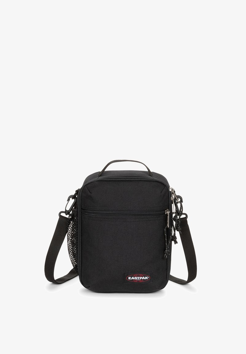 Borsa a tracolla nera in tessuto con compartimento principale con cerniera, tasca frontale, tracolla in nastro e logo Eastpak. Dotata di una tasca laterale in rete.