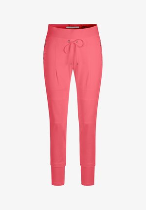Coral pink slim-fit pants with drawstring waist, zippered side pockets, and fitted cuffs.