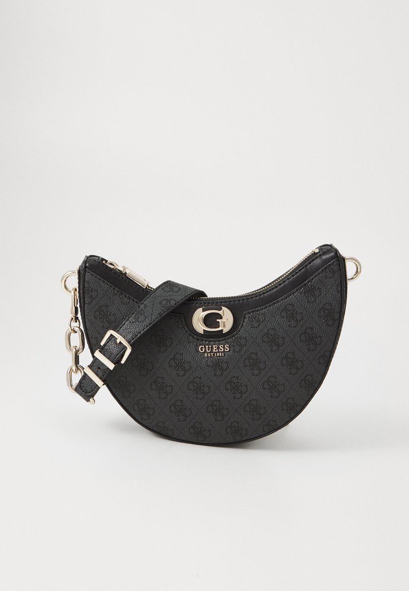 Black faux leather handbag with a crescent shape, gold hardware, and a shoulder strap featuring a chain. Logo prominently displayed.