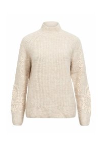 Adīta džemperis krēmkrāsā ar augstu apkakli. Piedāvā krēmkrāsas izšuvumus uz piedurknēm un faktūru, siltu audumu.