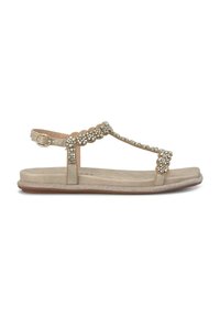 Gouden platte sandalen met T-band, verfraaid met heldere rhinestones en gladde synthetische banden. Getextureerde, gevoerde voetbed en flexibele zool.