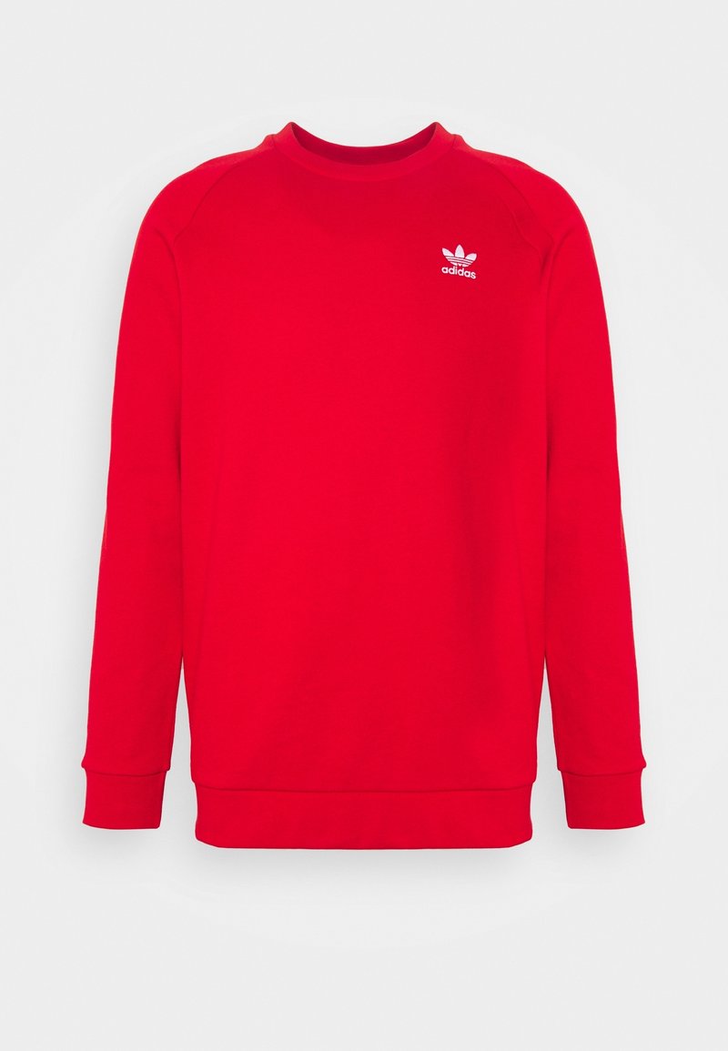 Sweat-shirt rouge à manches longues Adidas avec col rond et petit logo Adidas blanc sur la poitrine gauche.