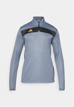 Hall gray spordipullover, millel on pooltõmbetõmbe lukk, must paneel rinna ümber ja oranž triibuline logo. Sile tekstuur ja pikad varrukad.