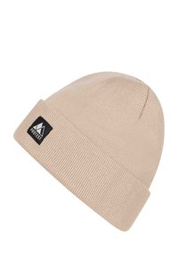 Beige knit beanie with a ribbed texture and a folded cuff. Features a black logo patch displaying a mountain design.