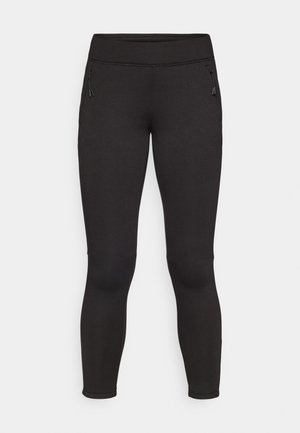 Leggings de sport noirs avec une texture lisse, une taille élastique et deux poches latérales zippées. Design ajusté et longueur totale.
