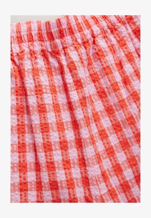 Rotes und pinkes Stoff mit Vichy-Karomuster und strukturierter Oberfläche, ausgestattet mit einem elastischen Bund für Komfort und Flexibilität.