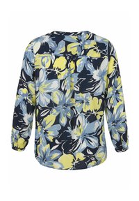 Blumenbluse mit dunkelblauem Hintergrund, verziert mit großen blauen, gelben und weißen Blumen. Lange Ärmel mit gerafften Manschetten und einem Knopfverschluss am Rücken.