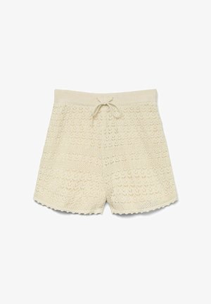 Kremfarvede strikkede shorts med blonderlignende mønster, elastik i taljen og bindebånd foran.