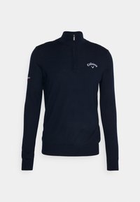 Pull en maille bleu marine avec col montant et fermeture éclair. Comprend un logo Callaway blanc sur la poitrine et un accent rouge sur la manche.