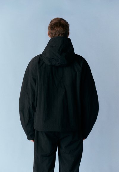 Han Kjøbenhavn WINDBREAKER TECHNICAL JACKET UNISEX - Windbreaker - anthracite black