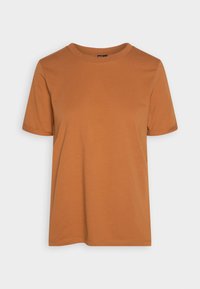 Tričko s krátkým rukávem v barvě rezavě oranžové bavlny. Kulatý výstřih, volný střih, hladká textura, s precizním prošíváním na lemech a rukávech.
