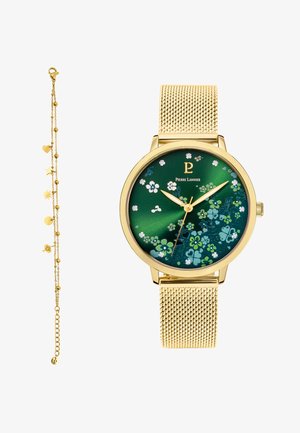 Hodinky s páskem zlaté síťoviny, zeleným ciferníkem s květinovým motivem a zlatými ručičkami, doplněné jemným zlatým náramkem s různými tvary.