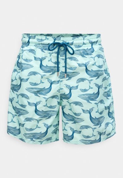 Svetlomodré plavky s tmavomodrými ilustráciami veľrýb a tmavomodrou šnúrkou v elastickom páse.