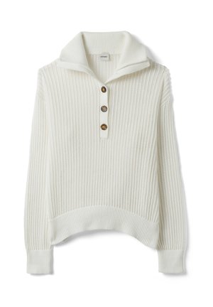 White knitted sweater with a high collar and three brown buttons on the front placket, featuring ribbed cuffs and hem.