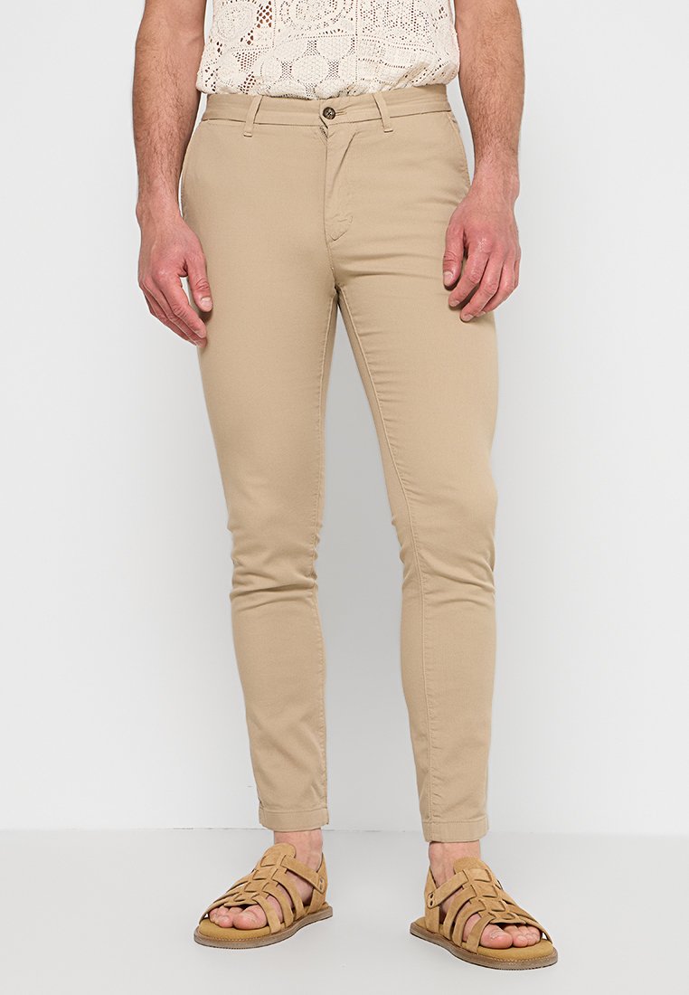 Tommy Hilfiger Chino zandkleur Tommy Hilfiger Chino zandkleur
