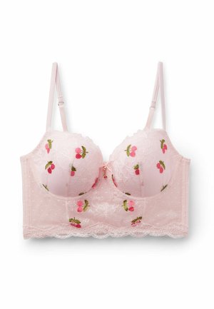 Jasnoróżowy koronkowy biustonosz z haftem wiśni, regulowanymi ramiączkami i falbanką z koronki na dolnym pasku.