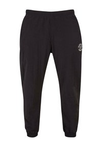 Schwarze Jogginghosen mit elastischem Bund und Bündchen. Mit Seitentaschen und einem runden Logopatch am oberen linken Bein. Weiches Material.