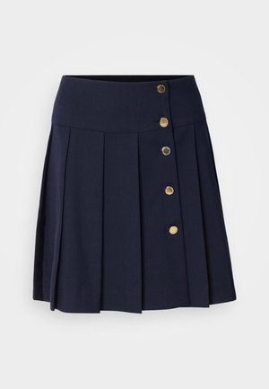 Navy blue pleated skirt with a high waistband, featuring five gold buttons on the front and a smooth texture. Suitable for various occasions.