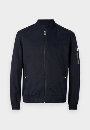 Navy bomber jacket made of smooth, lightweight fabric. Features a front zipper, ribbed collar, and side pockets with silver accents.