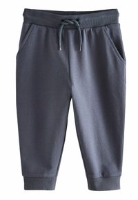 Graue Jogginghosen aus weichem Stoff mit elastischem Bund, Kordelzug, zwei Seitentaschen und gerippten Bündchen an den Knöcheln.