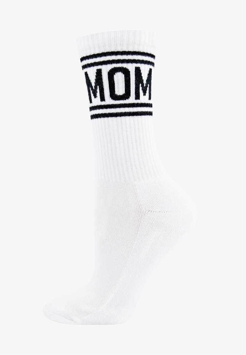 Weiße Knöchelsocke mit schwarzem "MOM"-Text und zwei schwarzen Streifen am oberen Rand. Gerippte Textur und eine taillierte Form für zusätzlichen Komfort.