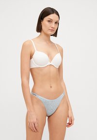 Calvin Klein Underwear DIPPED STRING THONG ICON - String - sterling blue