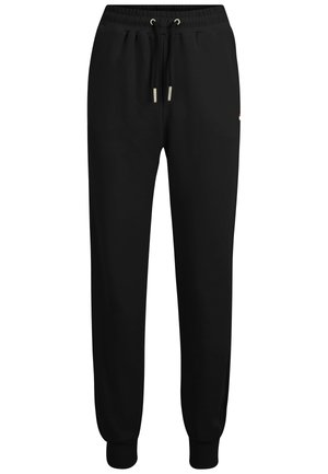 Pantaloni della tuta neri realizzati in tessuto morbido, dotati di una cintura elastica con cordino e polsini affusolati alle caviglie.