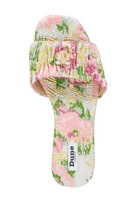 Mules featuring floral-patterned fabric in pink, green, and gold, with a textured upper, decorative flower accent, and a flat sole.