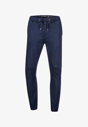 Marineblaue slim-fit Jogginghose mit elastischem Bund, Kordelzug, seitlichen Taschen und elastischen Bündchen.