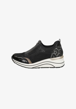 Black sneaker with a glossy toe, textured black side panel, animal print accents, and a contrasting white sole with curved lines.