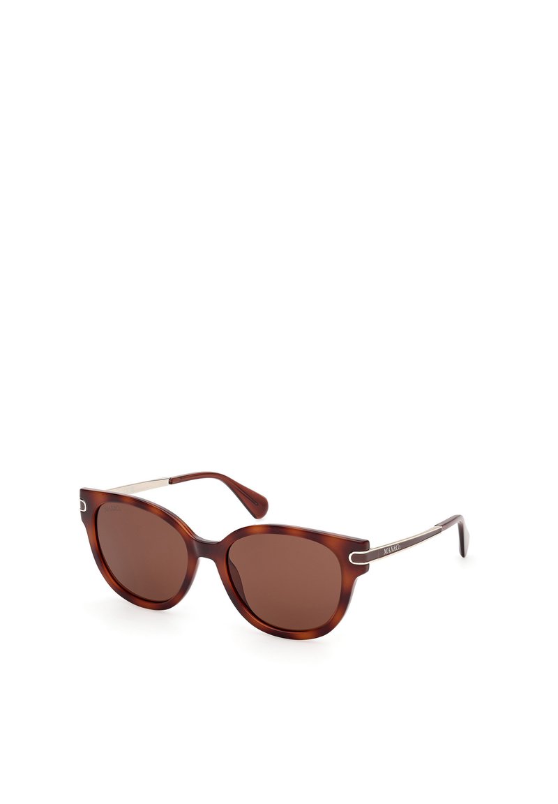 Ochelari de soare tortoise brown, cu rame supradimensionate și rotunde, lentile de culoare maroniu închis și accente de tonalitate argintie pe brațe.