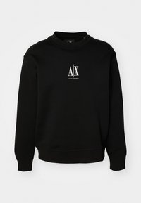 Black sweatshirt made of soft fabric, featuring a round neck, ribbed cuffs, and a white logo on the chest. Simple and unembellished design.