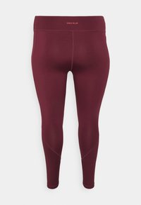 Burgunderfargede treningsleggings med en jevn tekstur, tettsittende design, og en myk midjebånd som viser "ONLY PLAY" i lys rosa.
