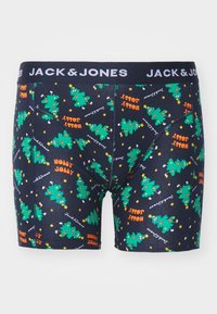 Boxershorts mit navy Hintergrund, verziert mit grünen Weihnachtsbäumen, gelben Sternen und dem Text "HOLLY JOLLY" in Orange. Weicher, elastischer Stoff.