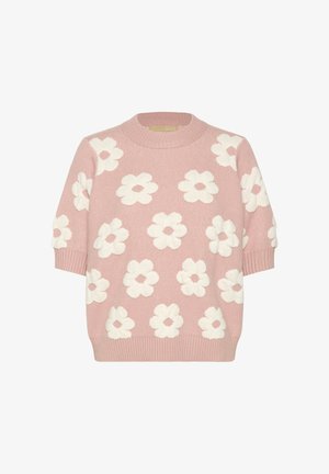 Ružičasti pleteni pulover s kratkim rukavima i bijelim cvjetnim uzorkom ravnomjerno raspoređenim po tkanini.