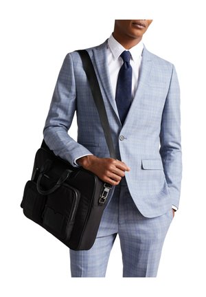 Black laptop bag with multiple compartments, handles, and an adjustable shoulder strap, paired with a light blue checkered suit.