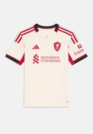 LFC futbola krekls krēmkrāsā ar sarkaniem akcentiem. Ar melnām svītrām ap kaklu un piedurknēm, ar sponsora logo priekšpusē un uz piedurknes.