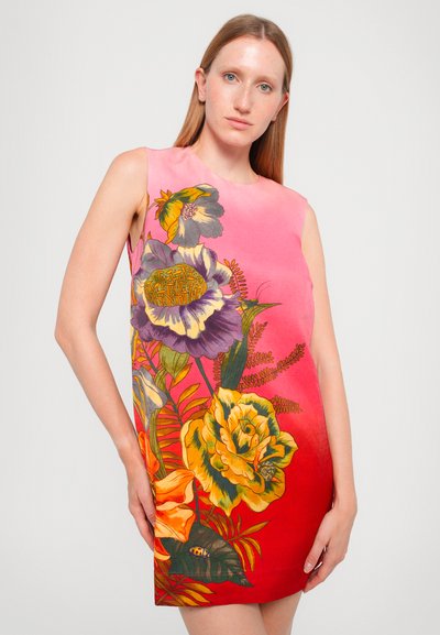 Short dress featuring a gradient from pink to red, adorned with large, colorful floral prints in yellow, purple, and green. Smooth fabric, sleeveless.