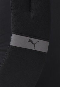 Puma BUZZ - Malý batoh  - black